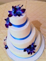 topaz blue, purple orchid and white wedding cake