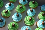 green and blue football cupcakes